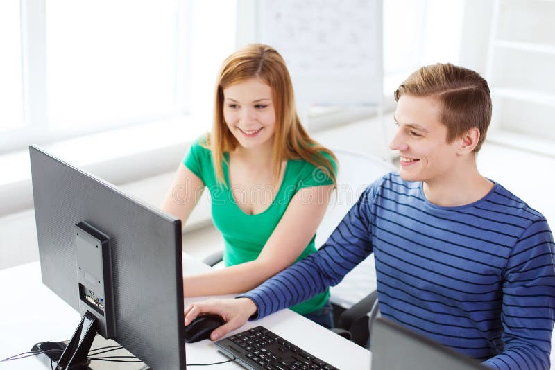 Two smiling students having discussion stock photos