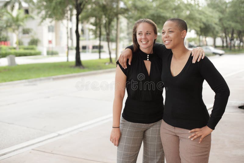 Two smiling women