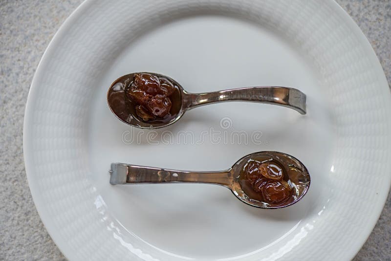 Two Spoons with Jam on a Plate Stock Image Image of spoon, plate