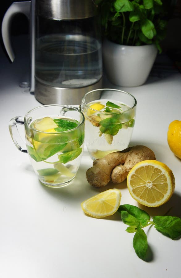 Two Teacups with Fresh Peppermint, Ginger and Lemon Stock Image Image