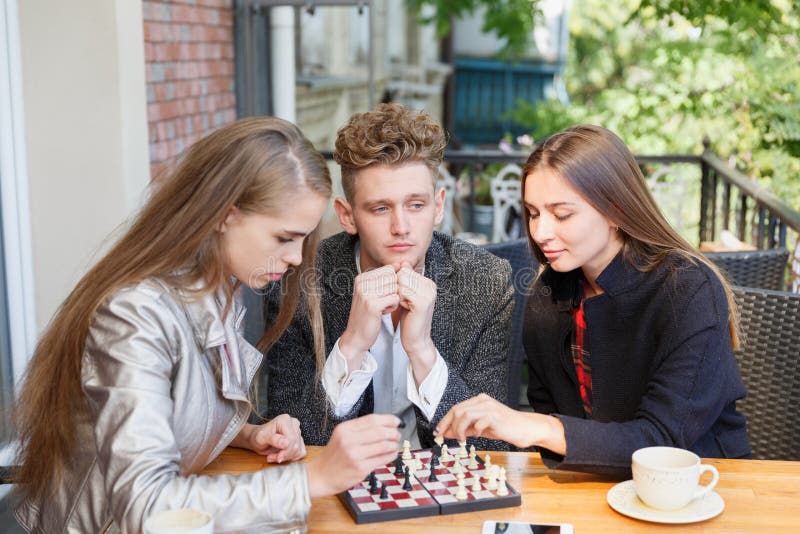 Free Photo  Friends playing chess game