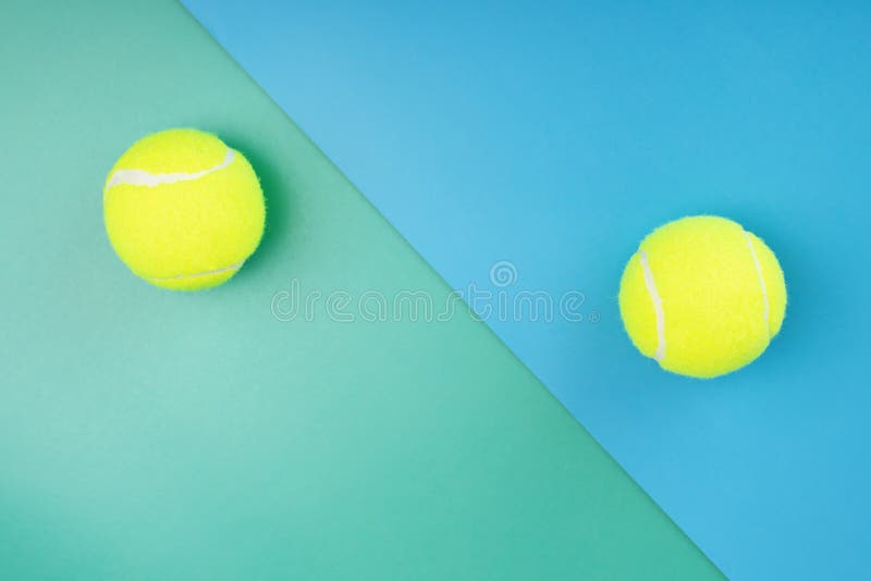 Two Tennis Balls on a Blue and Green Background Stock Image Image of