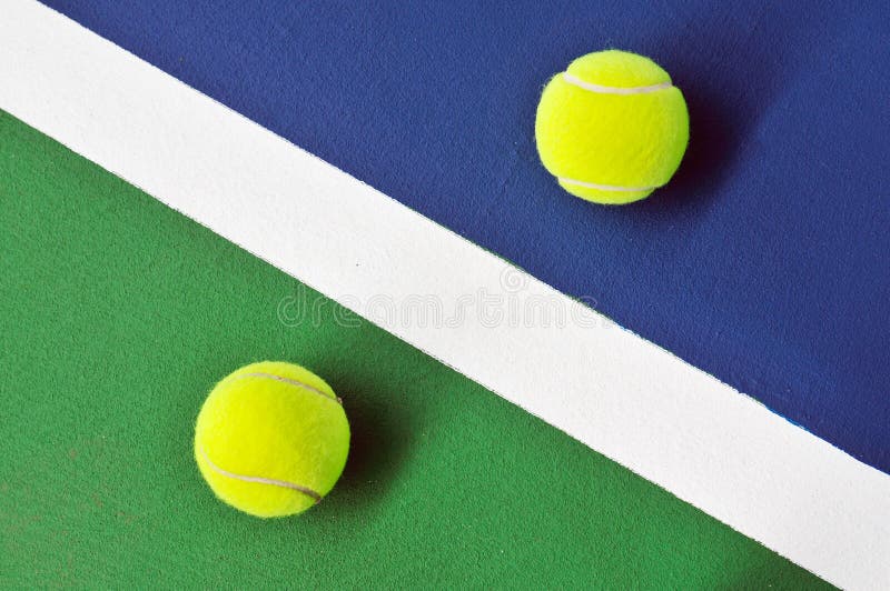 Two tennis balls on the tennis court