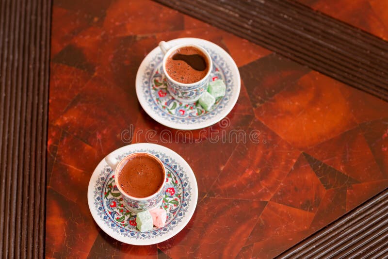Two Traditional Porcelain Turkish Coffee Cups with Turkish Delight