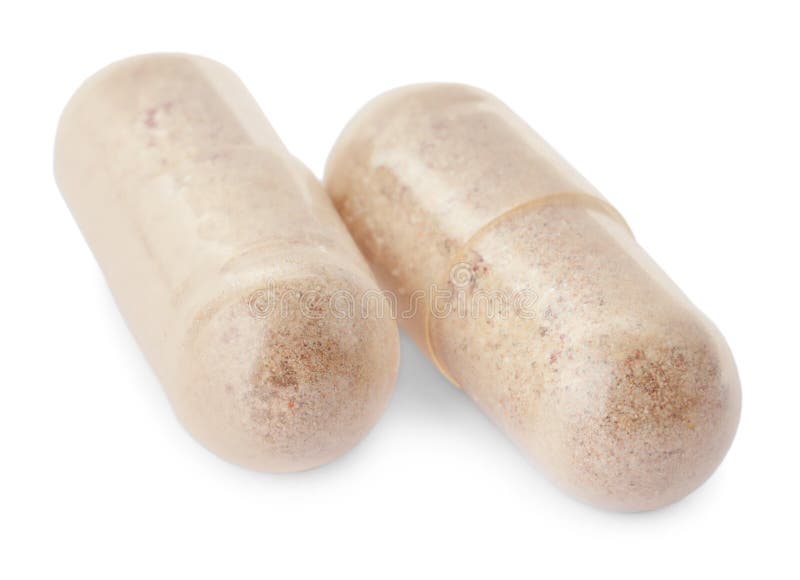 Two transparent gelatin capsules on white background, closeup