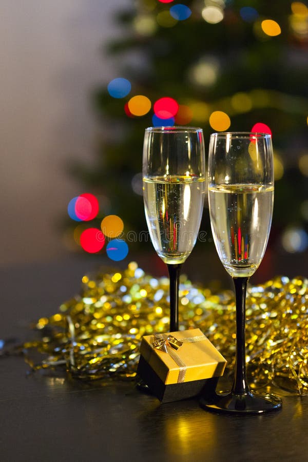 Two Transparent Glasses with Black Stems of Champagne with Bubbles Stock Photo Image of tinsel