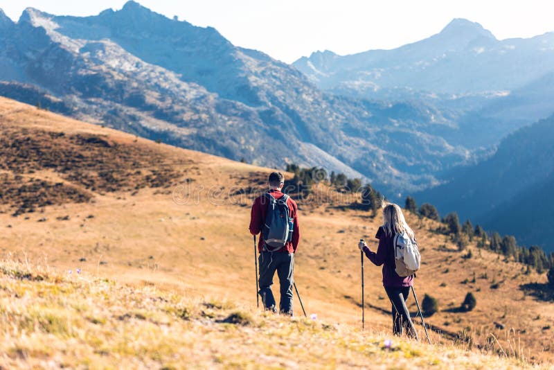 Two Travel Hikers with Backpack Walking while Looking the Landscape in ...