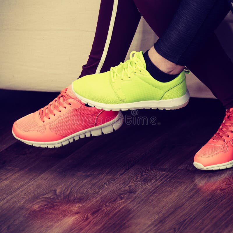 Two pairs of sport shoes stock image. Image of neon - 121831225