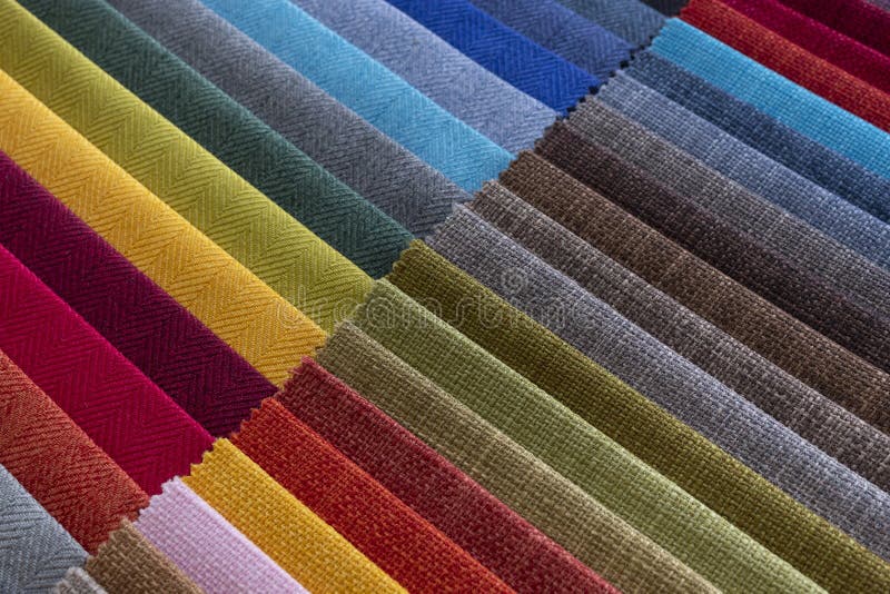 Two upholstery colorful cloth samples stock images