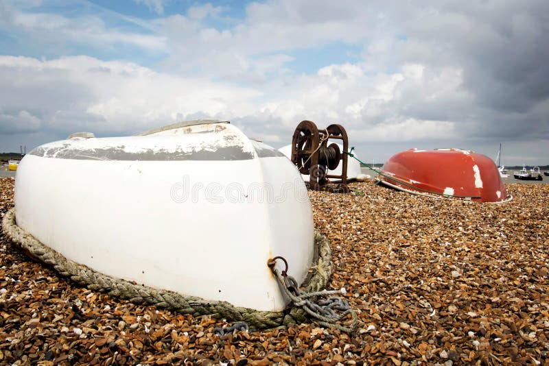 Two upturned row boats stock photos Two upturned row boats stock photos