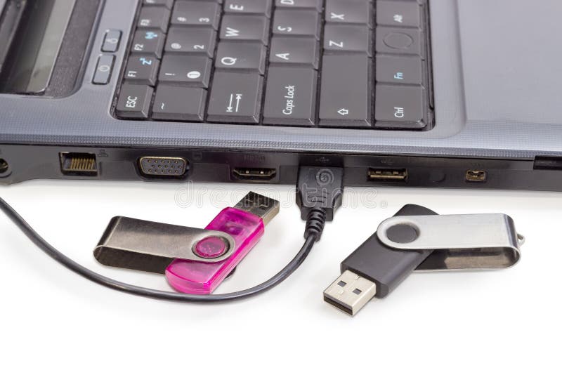 Two USB Flash Drives and USB Cable Against of Laptop Stock Image Image of communication, back
