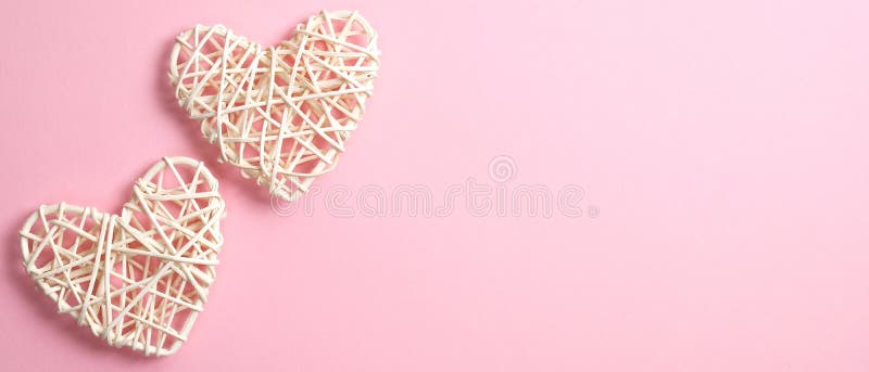 Two Valentine`s heart on pink background. Flat lay, top view. Happy Valentine`s Day banner mockup with, copy space. Love concept.