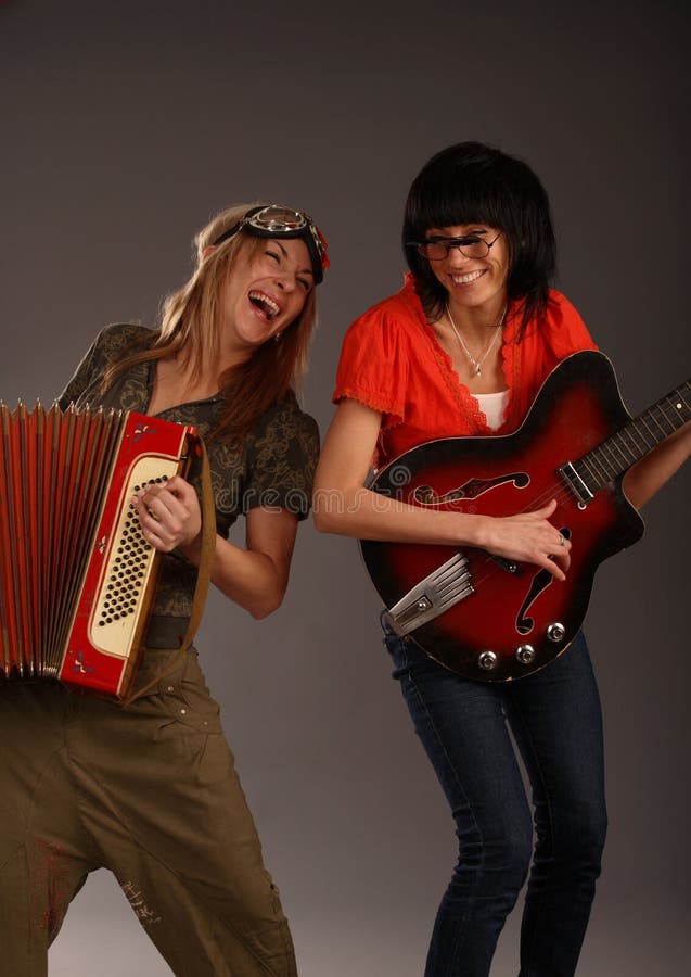 Two very funny music girls stock image. Image of attractive - 9478119 Two very funny music girls stock image. Image of attractive - 9478119