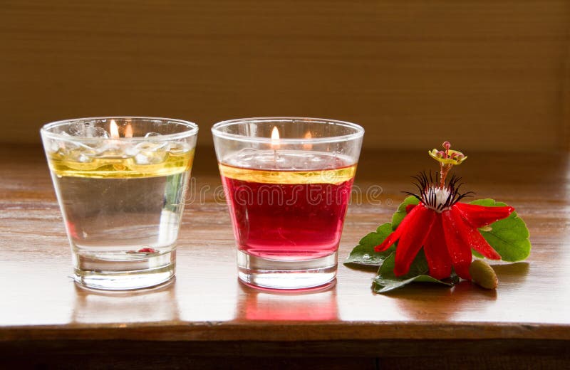 Red Granadilla Flower and Water Candle stock photo Red Granadilla Flower and Water Candle stock photo