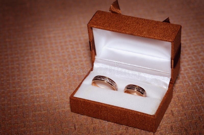 Two wedding rings in a box stock photo. Image of present 62971198