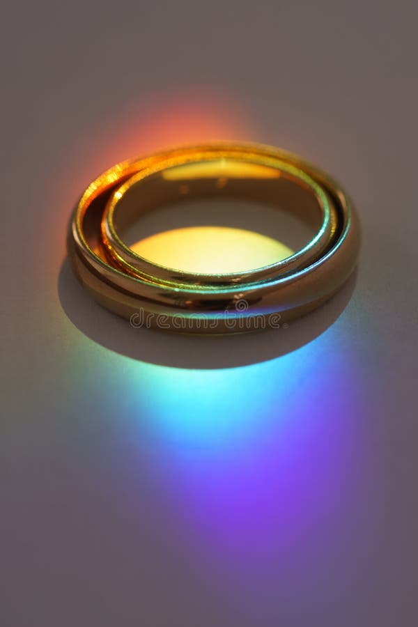 Two Wedding Rings with Rainbow Light Stock Photo Image of bisexual, equality 154070206