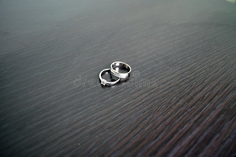 Two wedding rings in white gold with diamonds royalty free stock photos Two wedding rings in white gold with diamonds royalty free stock photos