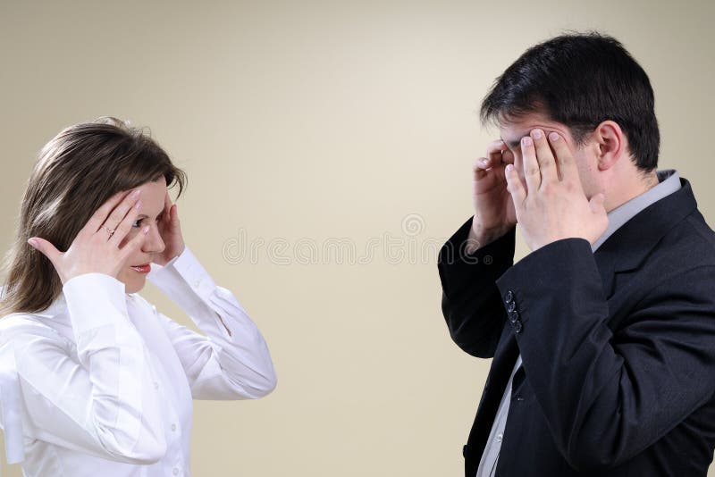 Two white colleagues having headache royalty free stock photos