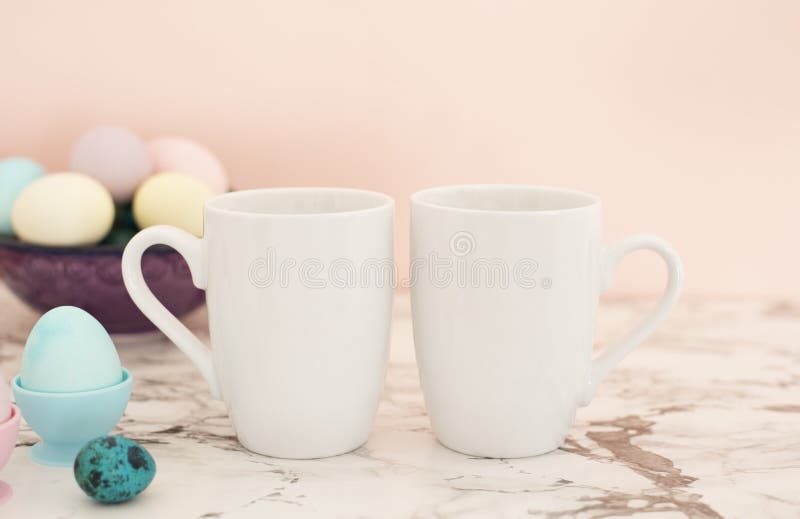 Download Two White Mugs Mockup Easter Theme Easter Eggs Colorful Eggs In Matte Colors Light Marble Background Stock Photo Image Of Coffee Flowers 138538132