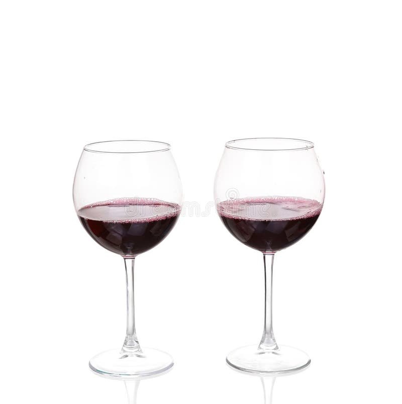 Two Wine Glasses with Red Wine on White Background stock images