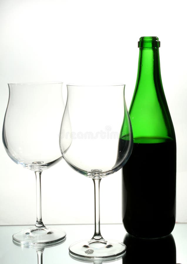 Two wine glasses with red wine royalty free stock photos