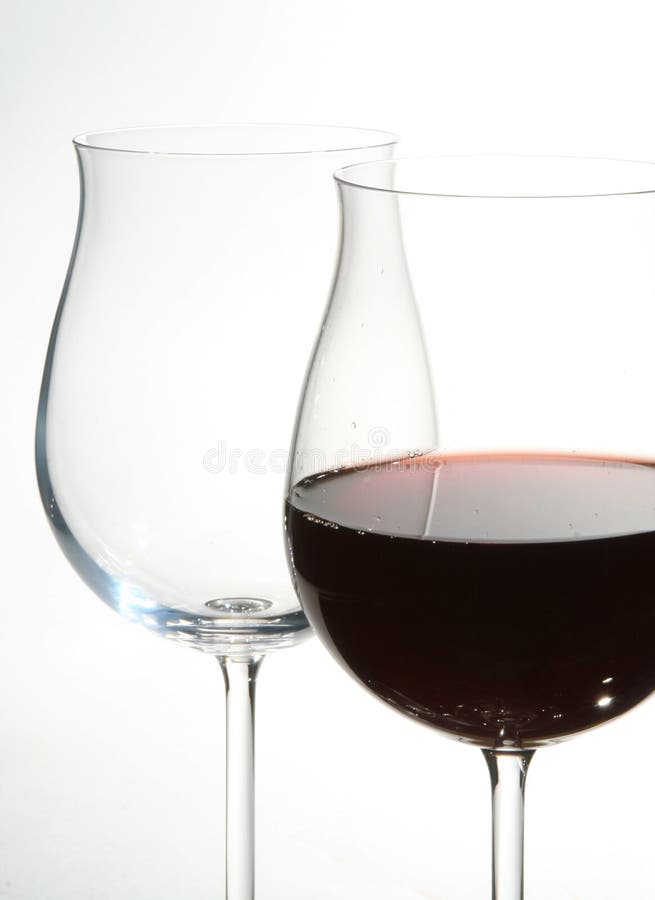 Two wine glasses with red wine stock image