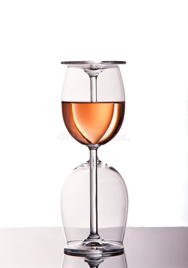 Two wine glasses with rose wine royalty free stock images