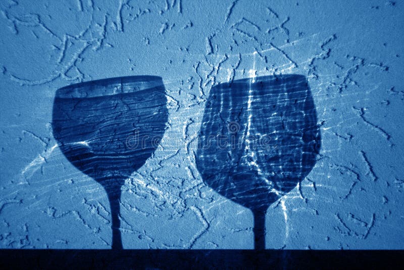 Two wine glasses shadow in navy blue tone