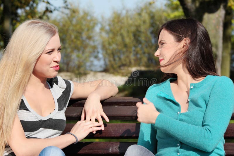 Two woman at park stock image Two woman at park stock image