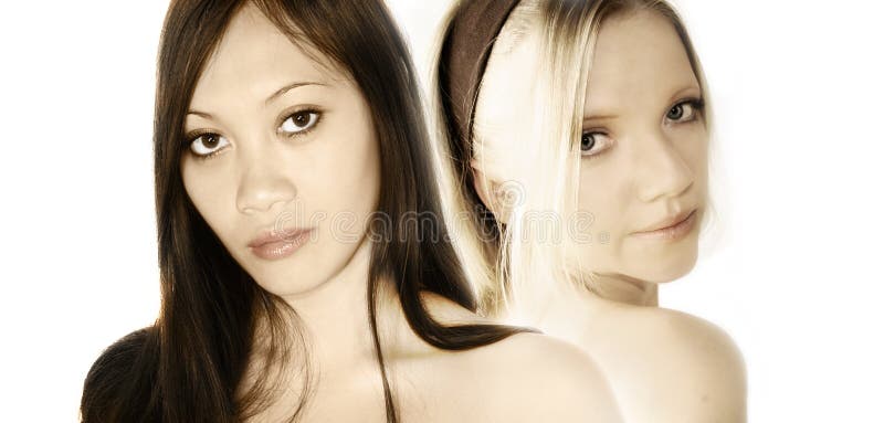 Portrait of two young and beautiful women, a asian girl with black hair and a european girl with blond hair. Portrait of two young and beautiful women, a asian girl with black hair and a european girl with blond hair