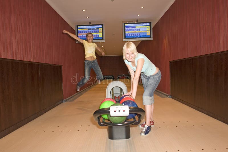 Two women bowling stock image. Image of balls, females 3013525