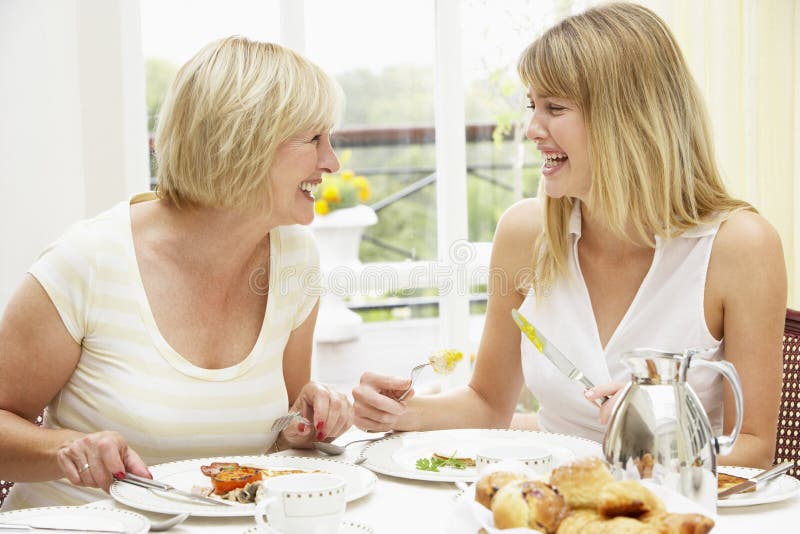 Two Women Enjoying Hotel Breakfast