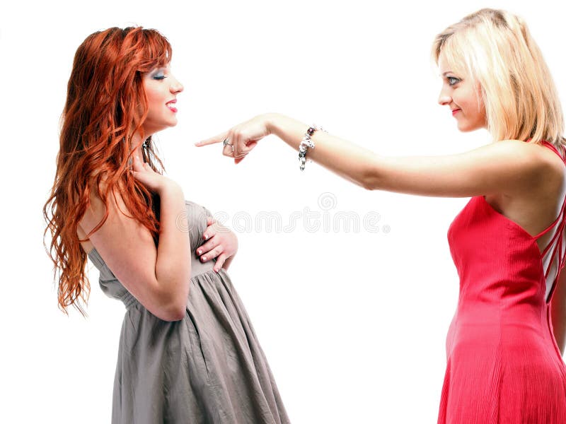 Two women ginger with blonde in gowns on white