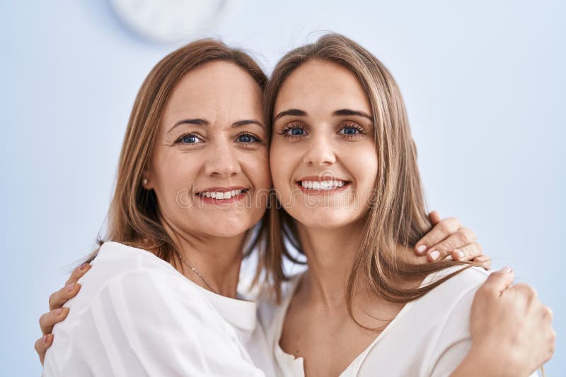 Two Women Mother and Daughter Hugging Each Other at Home Stock Photo ...