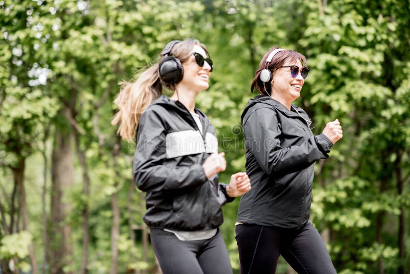 Two women running in the park