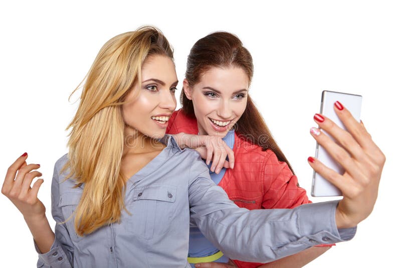 Two Women Sharing Social Media in a Smart Phone Stock Image - Image of ...