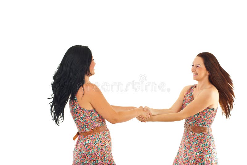 Two women twirl together royalty free stock photo Two women twirl together royalty free stock photo