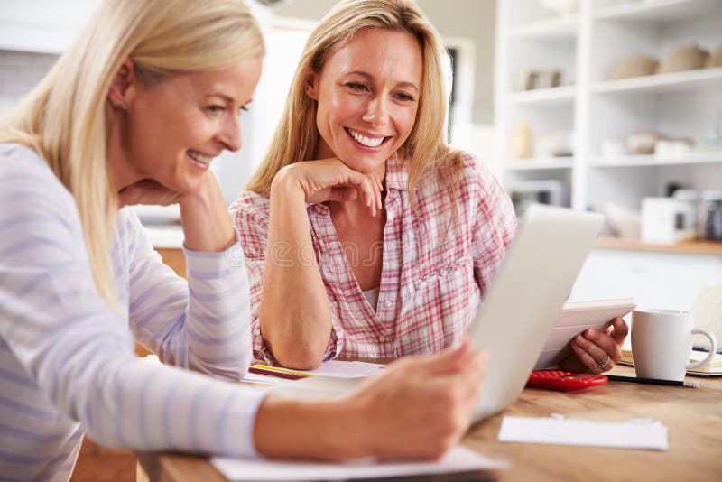 Two women working together at home