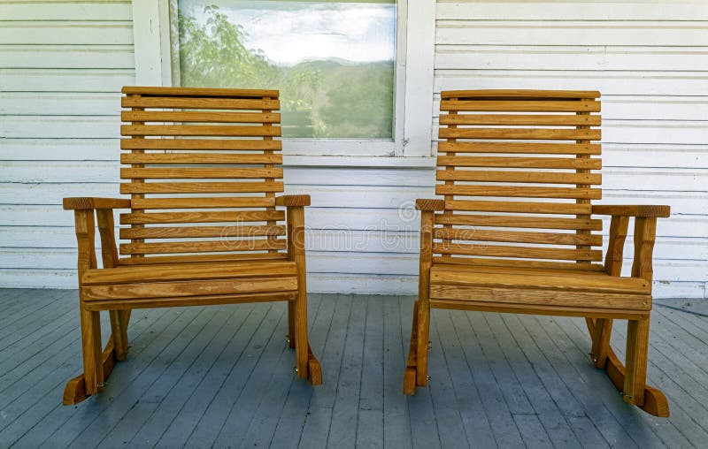 Two Wood Rocking Chairs Set on a White Wood Porch Stock Photo Image