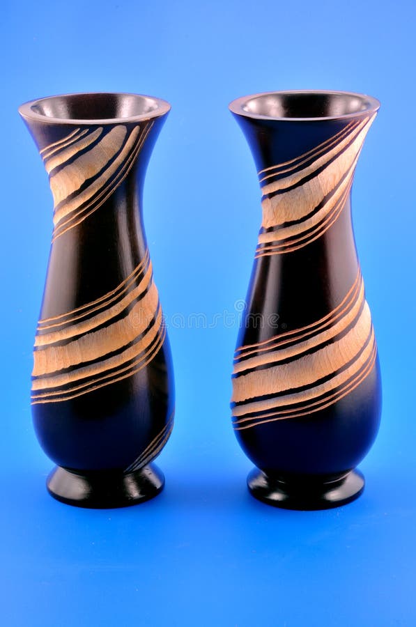 Two wooden vases