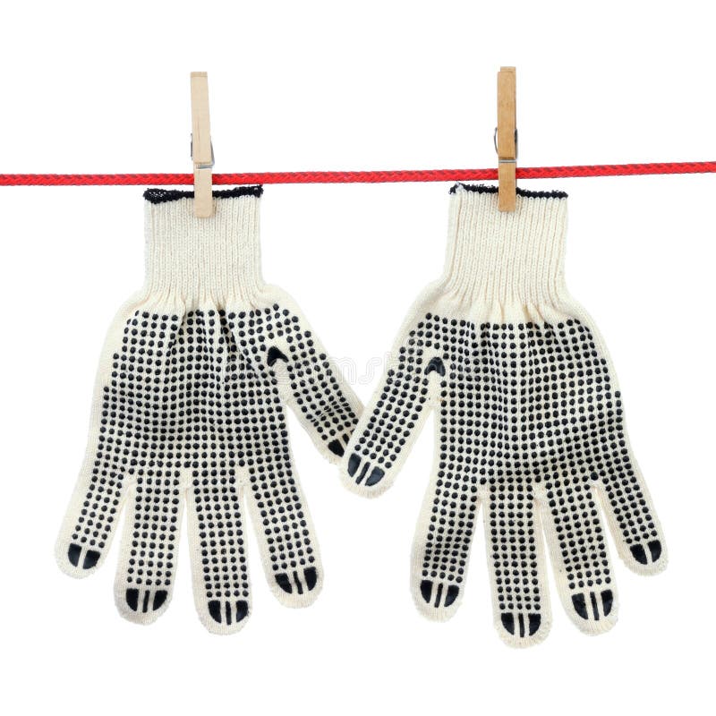 Two gloves on the clothesline over white background. Pair working gloves stock images, royalty-free photos and pictures