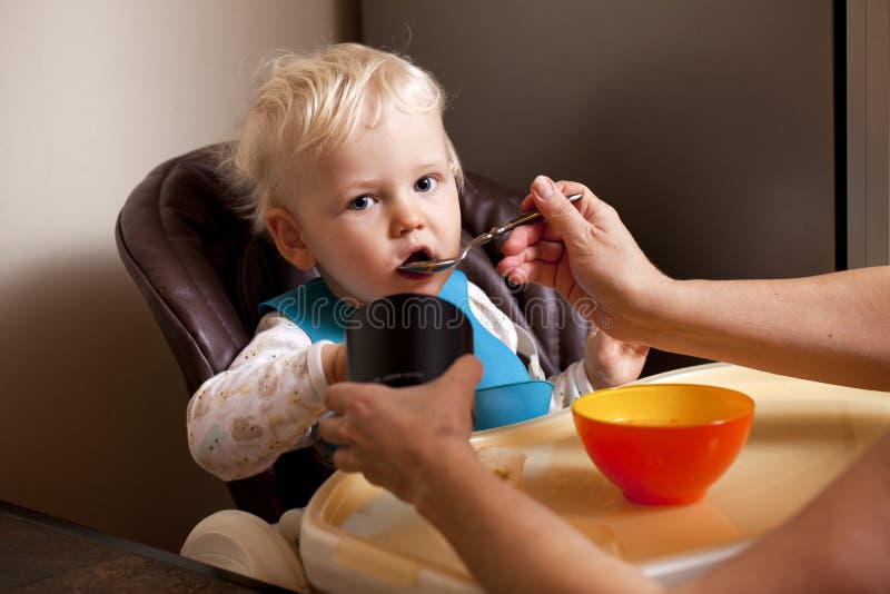 Two Year Baby Boy Sitting at the Dinner Table Stock Photo Image of