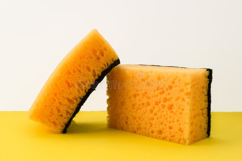 Yellow Kitchen Sponge On White Background. Dish Sponge Background