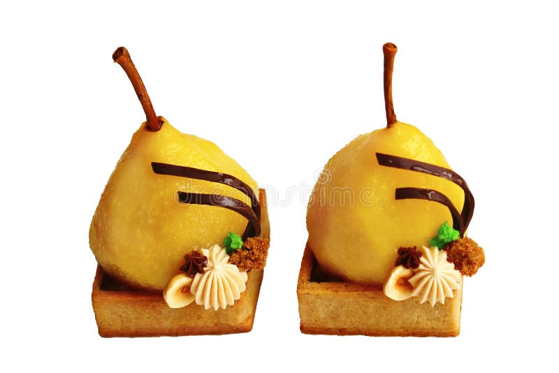 Two yellow poached pear tarts with hazelnuts, soft sponge and hazenut ganache