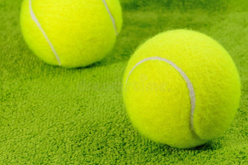 Two tennis balls on green stock photo. Image of match, soft 876636