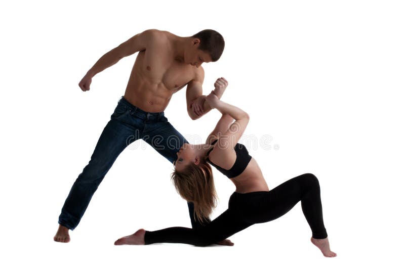 Two young acrobats posing in dance