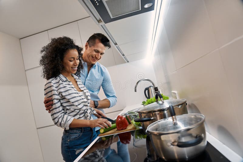 Two Young Adult People Cooking Dinner on Kitchen Stock Photo - Image of
