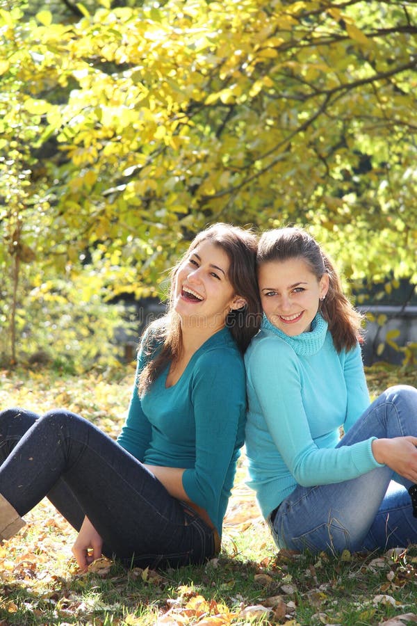 Two young attractive women on nature