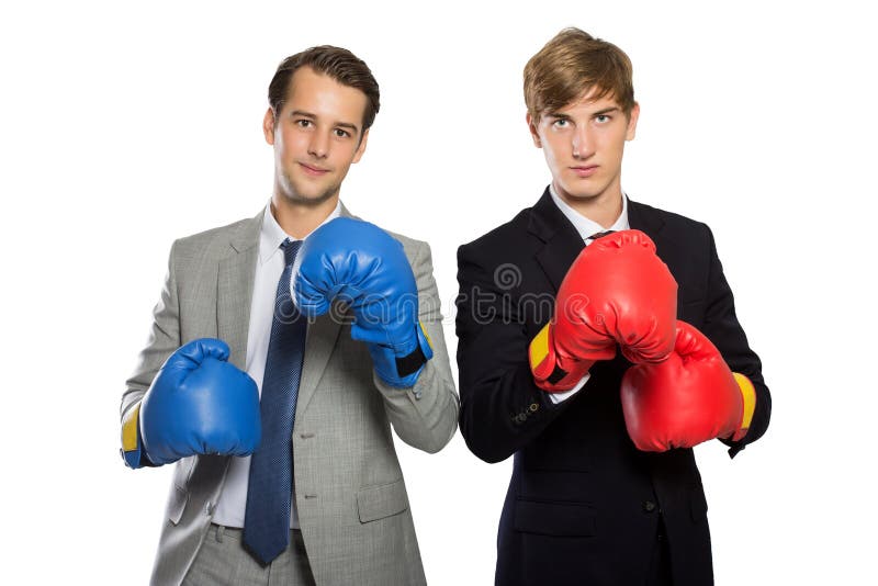 Two young businessman with boxing gloves, rivalry concept, isola royalty free stock photo Two young businessman with boxing gloves, rivalry concept, isola royalty free stock photo