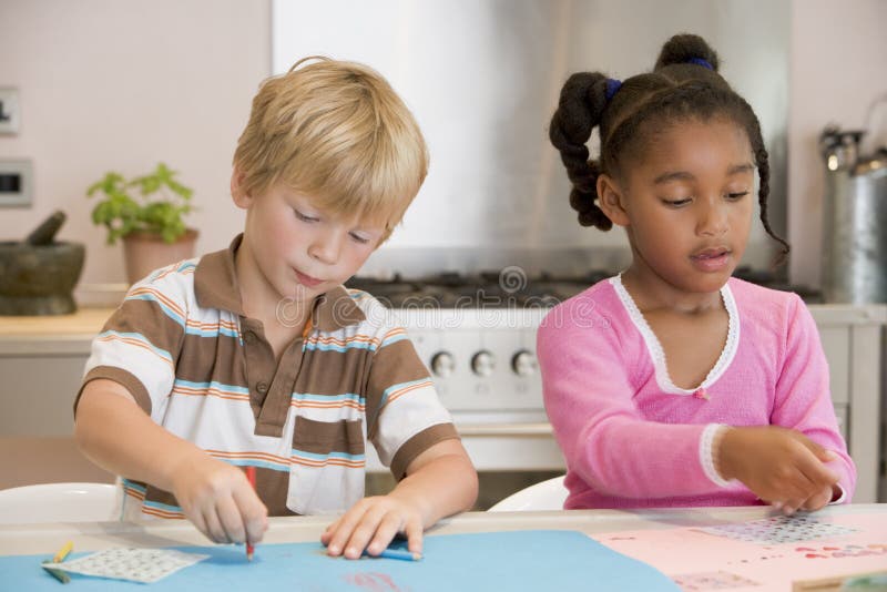 Two Young Friends Drawing Pictures stock photo Two Young Friends Drawing Pictures stock photo